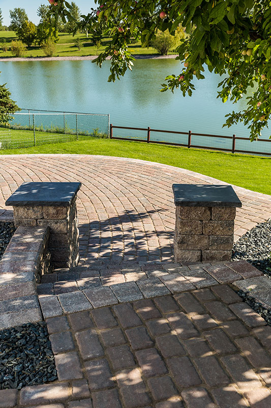 cobble paver path with lake